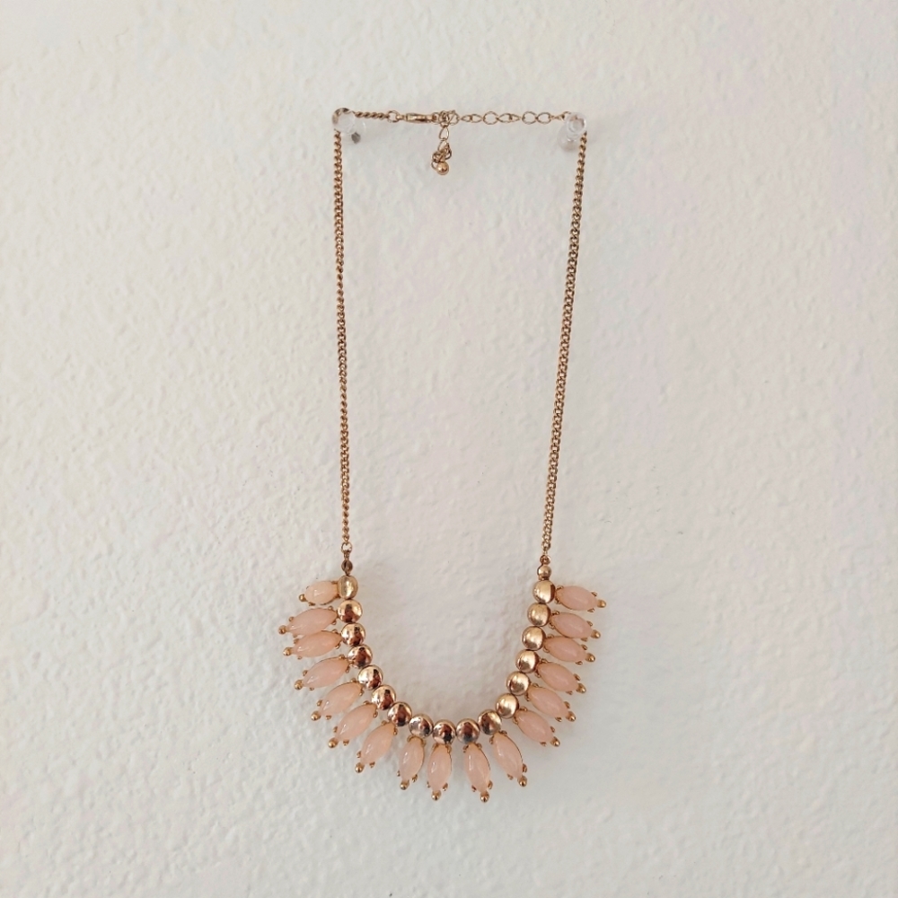 Pastel pink and gold gem pendant bib necklace